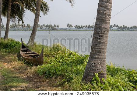 Landscape View Of Wetland Area With Traditional Canoe,  In Kochi, Kerela, India