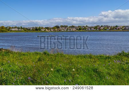 Lough Atalia Bay With Houses In Background