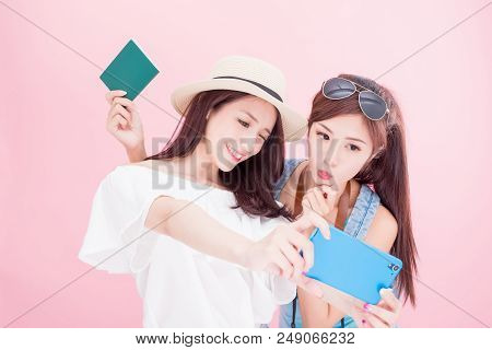Two Beauty Woman Selfie Happily With Travel Concept On The Pink Background