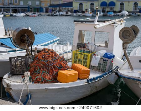 Closeup Of A Colorful Fishing Net And Other Accessories Lying On A Boat, Cres Croatia