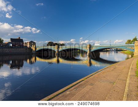 Reflections On The River Trent Late In The Afternoon On A Spring Day