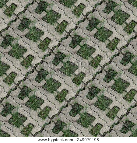 Seamles Pattern Of Concrete Road Tile On The Green Grass Path