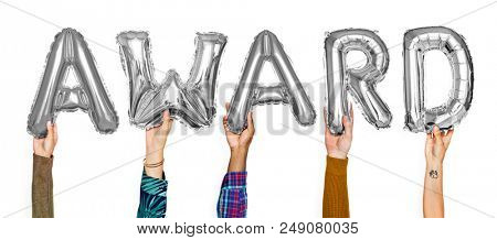Hands showing award balloons word