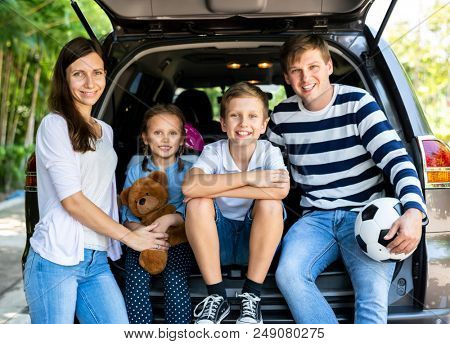 Happy family on a road trip