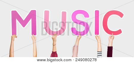 Diverse hands holding the word music