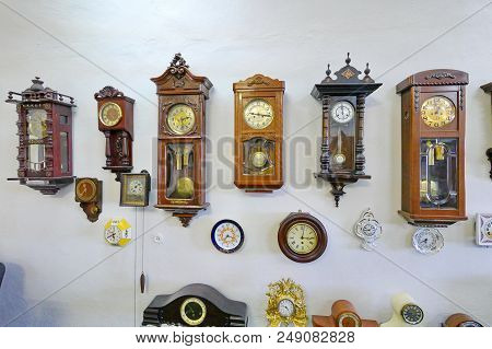A Huge Number Of Completely Different Clock Devices Are Located On One Wall