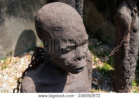Stone Town, Zanzibar - January 9, 2015: Sculpture Of Slaves Dedicated To Victims Of Slavery In Stone