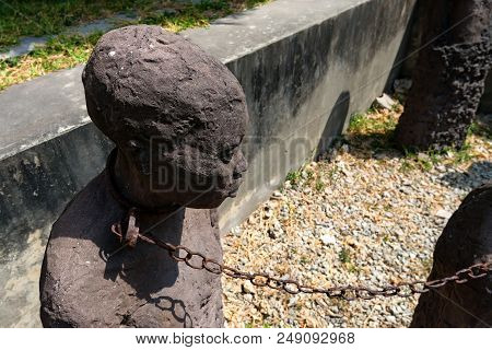 Stone Town, Zanzibar - January 9, 2015: Sculpture Of Slaves Dedicated To Victims Of Slavery In Stone