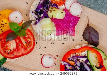 Open Sandwiches Of Rice Cakes With Cream Cheese , Vegetables, Healthy Breakfast