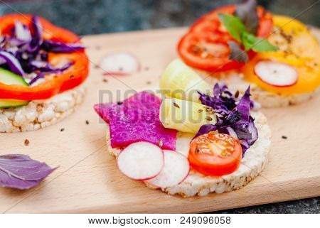 Open Sandwiches Of Rice Cakes With Cream Cheese , Vegetables, Healthy Breakfast