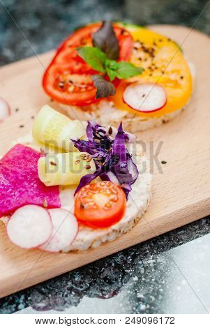 Open Sandwiches Of Rice Cakes With Cream Cheese , Vegetables, Healthy Breakfast