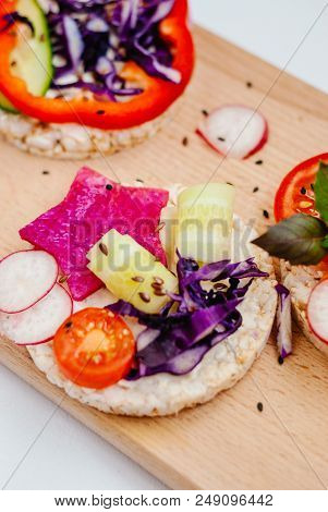 Open Sandwiches Of Rice Cakes With Cream Cheese , Vegetables, Healthy Breakfast