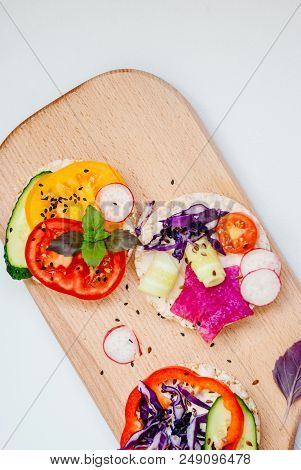Open Sandwiches Of Rice Cakes With Cream Cheese , Vegetables, Healthy Breakfast