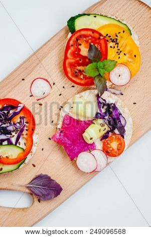 Open Sandwiches Of Rice Cakes With Cream Cheese , Vegetables, Healthy Breakfast