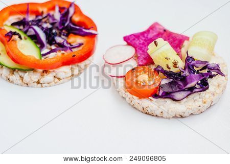 Open Sandwiches Of Rice Cakes With Cream Cheese , Vegetables, Healthy Breakfast