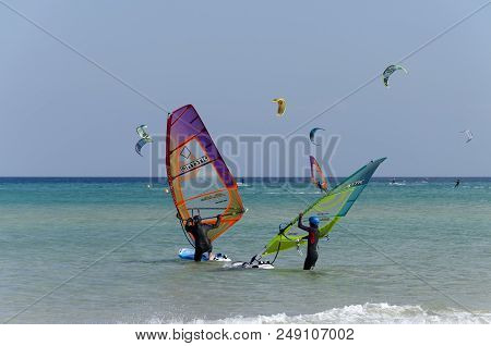 Sotavento Beach, Fuerteventura, Canary Islands, Spain: May 26th, 2018. Windsurfers And Kitesurfers F