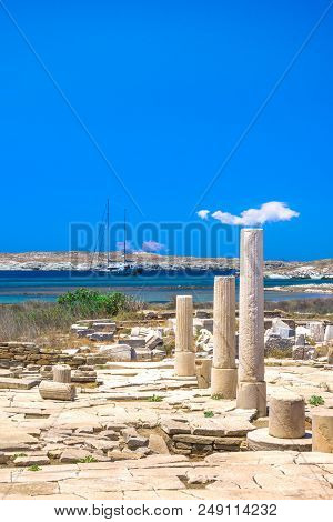 Ancient Ruins In The Island Of Delos In Cyclades, One Of The Most Important Mythological, Historical