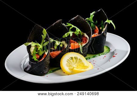Russin Cuisine In Modern Form. Homemade Black Pancakes Blini With Cuttlefish Ink Served With Salmon 