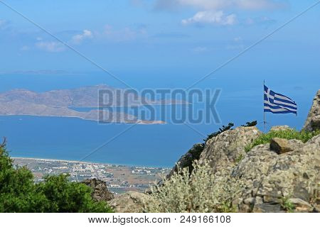 View From The Mountain Dikeos To Greek Summit Flag And Look To The Sea In Kos, Greece.
