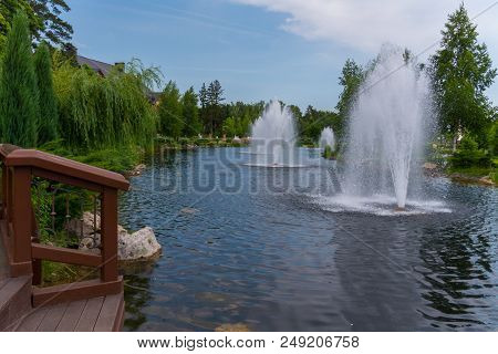An Unusual Fountain With Three Beating Geysers And A Descent With Stairs. You Can Come, Wet Your Han