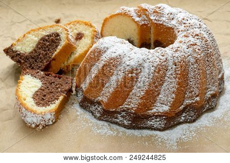 Traditional Homemade Marble Cake. Sliced Marble Bundt Cake On Paper.
