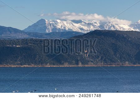 Amazing Winter Landscape Of Lake Pamvotida And Pindus Mountain From City Of Ioannina, Epirus, Greece