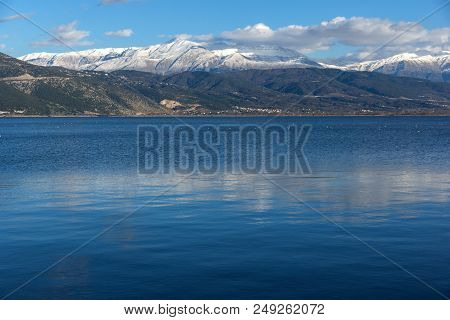 Amazing Winter Landscape Of Lake Pamvotida And Pindus Mountain From City Of Ioannina, Epirus, Greece