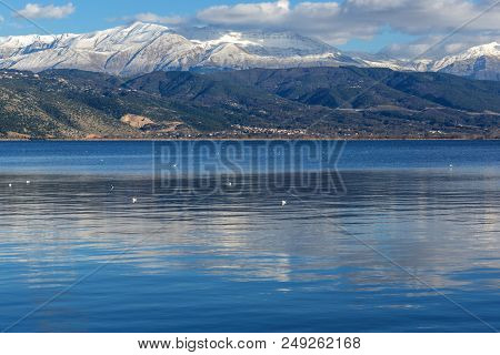 Amazing Winter Landscape Of Lake Pamvotida And Pindus Mountain From City Of Ioannina, Epirus, Greece