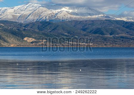Amazing Winter Landscape Of Lake Pamvotida And Pindus Mountain From City Of Ioannina, Epirus, Greece