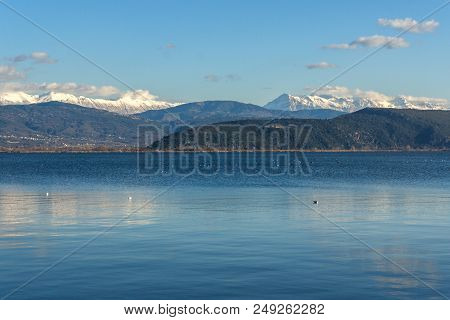 Amazing Winter Landscape Of Lake Pamvotida And Pindus Mountain From City Of Ioannina, Epirus, Greece