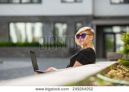 Girl In Sun Glasses Plus Size Is Happy On Bright Sunny Day In The Street, Haircut Creative. Student 