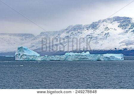 Large Iceberg Off The Coast Of Greenland Along The Nugssuaq Peninsula