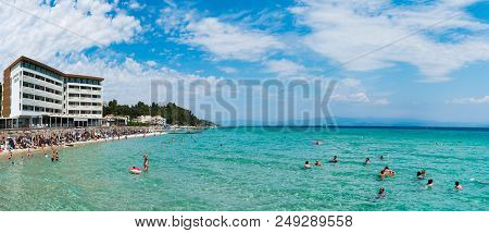 Chaniotis, Greece - June 23, 2018: Chaniotis City Beach And Clear Sea Of Chalkidiki With Many Touris
