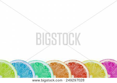 Close-up Of Sliced Multi Colored Fruits On A White Background.
View To To Fresh Colorful Citrus Frui