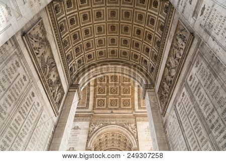 The Arc de Triomphe in Paris as seen from under the arc