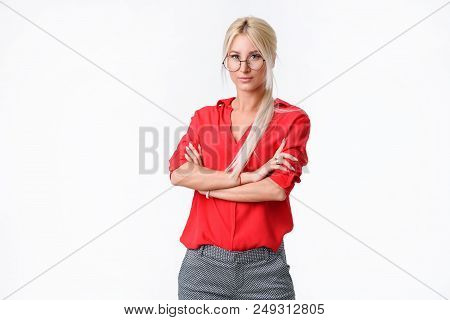 Portrait Of A Young Business Woman In A Business Suit And Glasses On An Isolated White Background