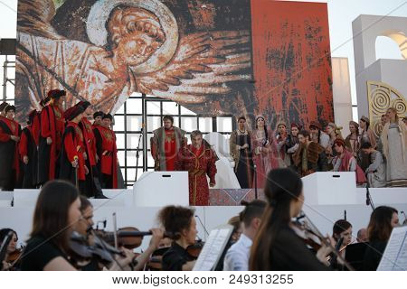 ST. PETERSBURG, RUSSIA - JULY 12, 2018: Actors perform the opera The Tsar's Bride of N. Rimsky-Korsakov outdoors during the festival All Together Opera. It was first of 4 performances