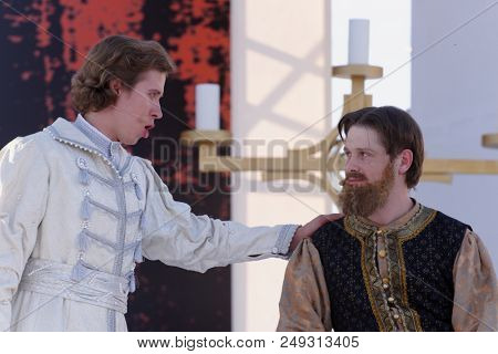 ST. PETERSBURG, RUSSIA - JULY 12, 2018: Yevgeny Chernyadiev as Sobakin (right) and Ilya Selivanov as Lykov in the opera The Tsar's Bride outdoors during the festival All Together Opera