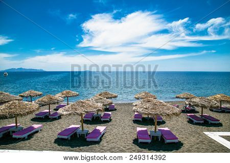 Permissa black sand beach in Santorini. Greece. 