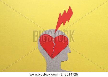 The Image Of A Man With A Broken Lightning Bolt, A Pain Of Separation, A Blow Of Fate, A Yellow Back