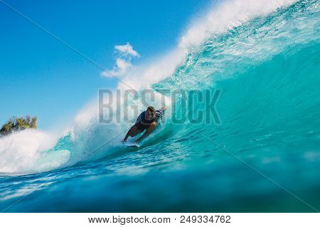 July 7, 2018. Bali, Indonesia. Surfer Ride On Big Barrel Wave At Padang Padang. Professional Surfing