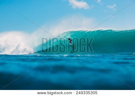 July 7, 2018. Bali, Indonesia. Surfer Ride On Big Barrel Wave At Padang Padang. Professional Surfing