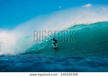 July 7, 2018. Bali, Indonesia. Surfer Ride On Big Barrel Wave At Padang Padang. Professional Surfing