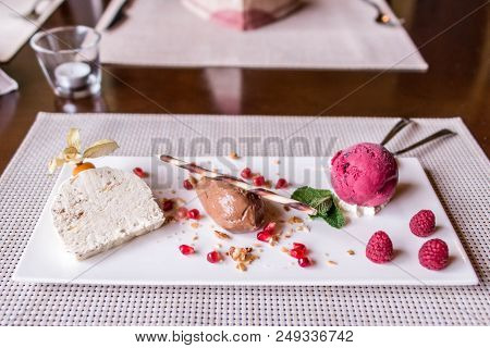 Piece Of Brown Mousse A U Chocolate Sweet Dessert And Decoration On A White Plate Background