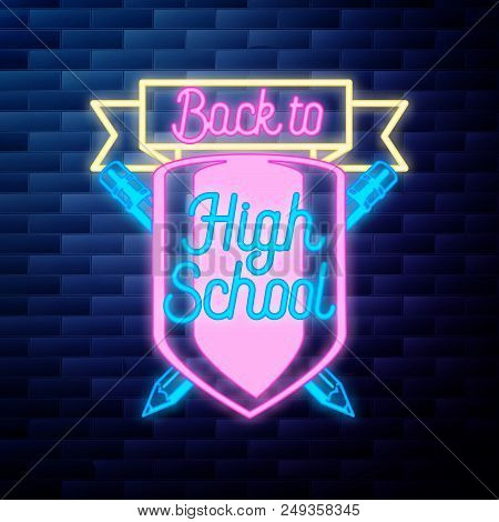 Vintage Back To School Emblem Glowing Neon Sign On Brick Wall Background