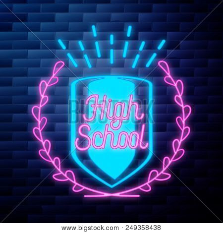 Vintage Back To School Emblem Glowing Neon Sign On Brick Wall Background
