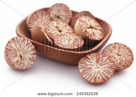 Betel Nuts In A Bowl Over White Background
