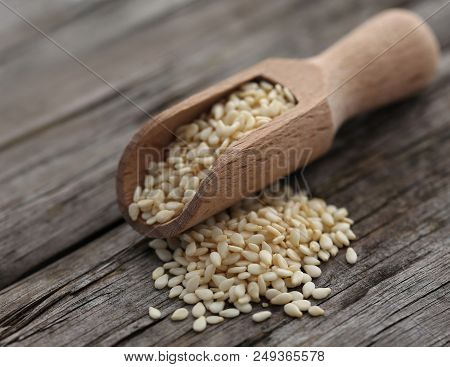 Peeled Sesame Seeds In A Scoopn Won Wooden Surface