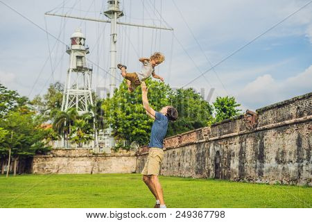Dad And Son On Background Of Fort Cornwallis In Georgetown, Penang, Is A Star Fort Built By The Brit