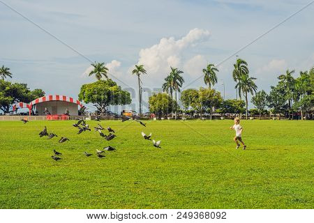 Boy On Padang Kota Lama Or Simply Called The Padang, Is The Parade Ground And Playing Field Created 